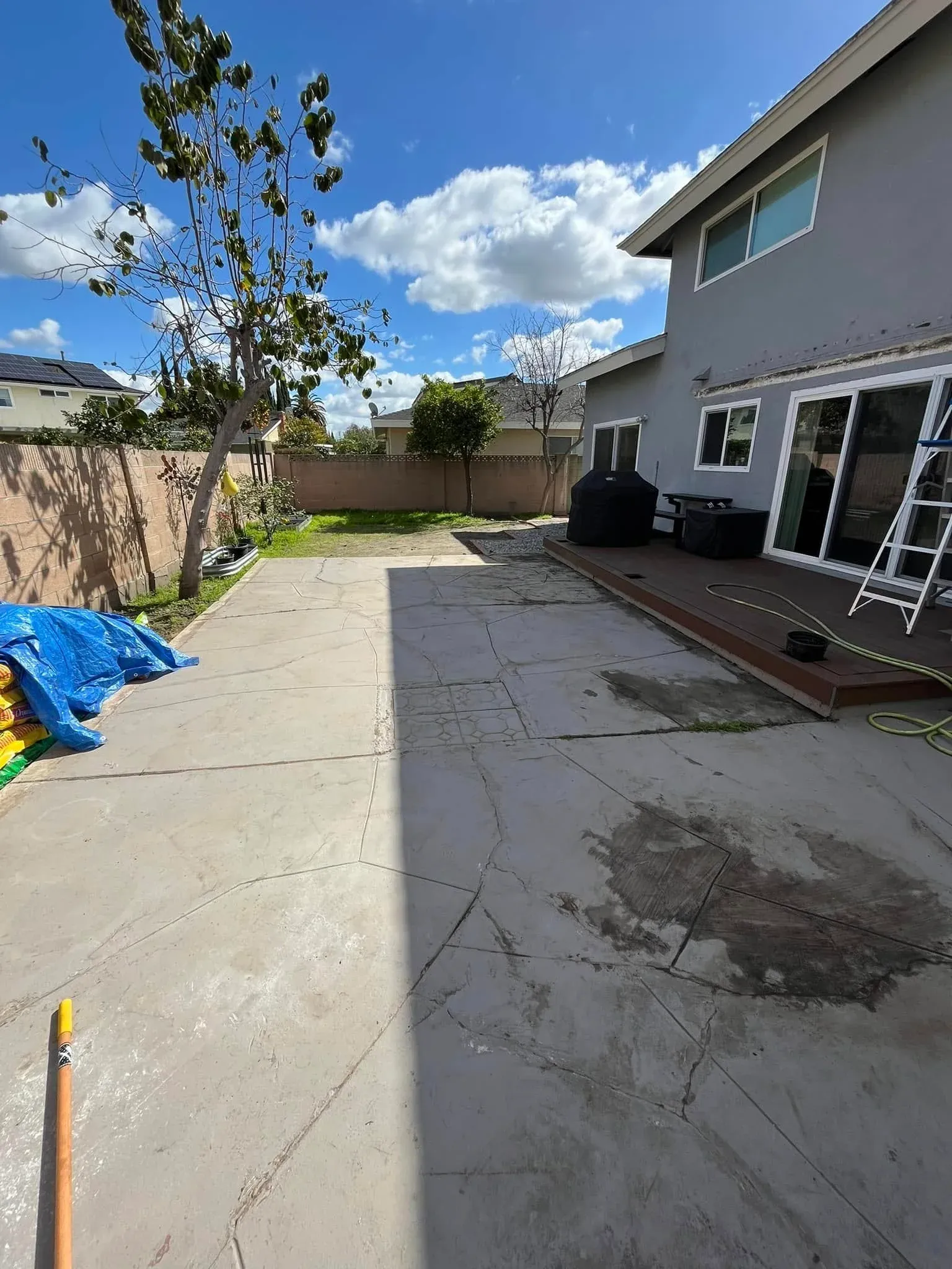 After view of a cleared driveway and outdoor area following professional garden clearance and junk removal